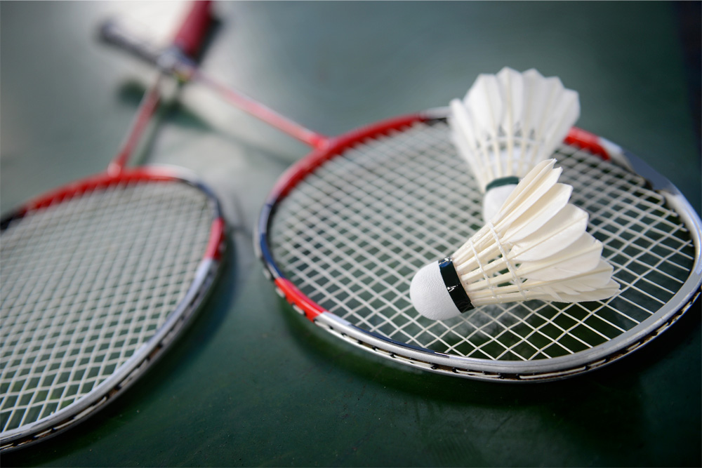 badminton rackets and a birdie