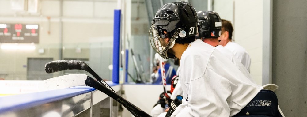 A hockey player on the bench at the Milton Sports Centre
