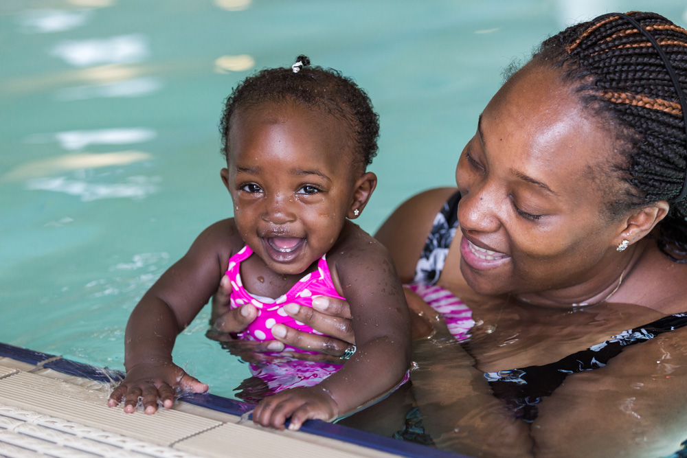 mother and child in pool