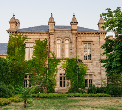 Town Hall building with trees and a blue sky