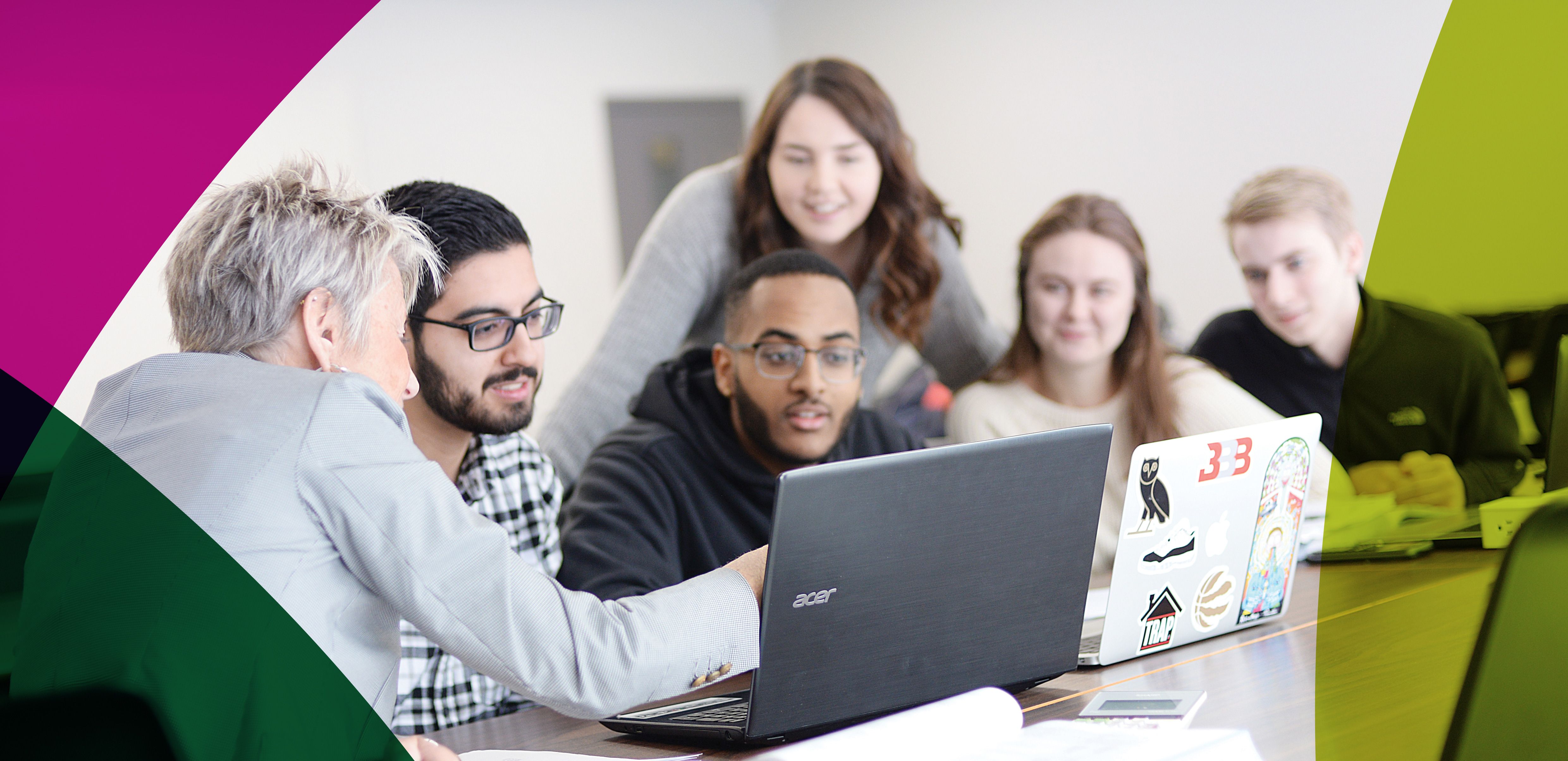 People around laptop communicating