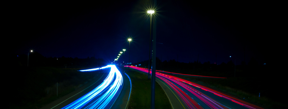 a night time shot of the 401 lit up