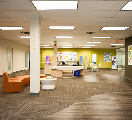 A large room with chairs and tables