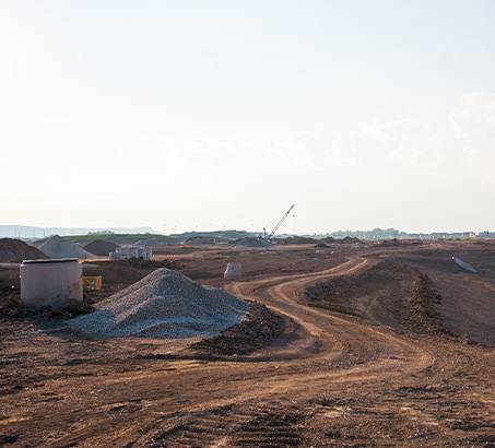 A construction area with dirt roadways