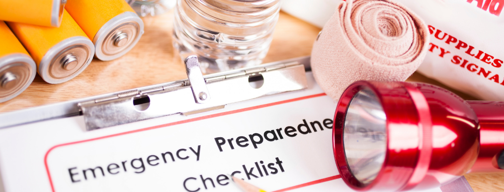 Photo of emergency checklist and supplies