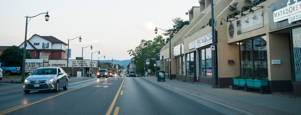 Cars driving down Main Street in Milton, Ontario