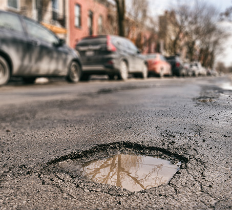 A pothole in a residential road