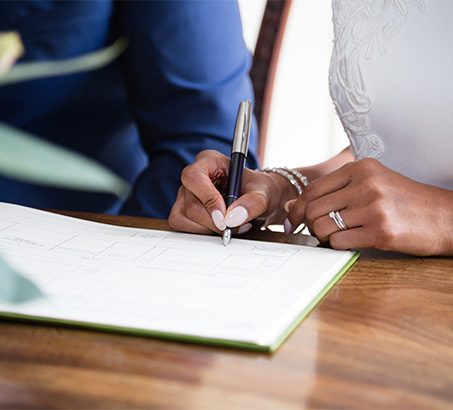 A person signing a marriage license