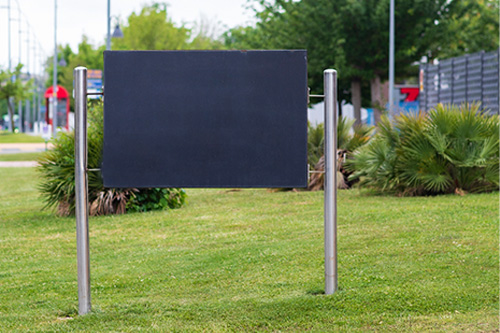 A sign on a lawn