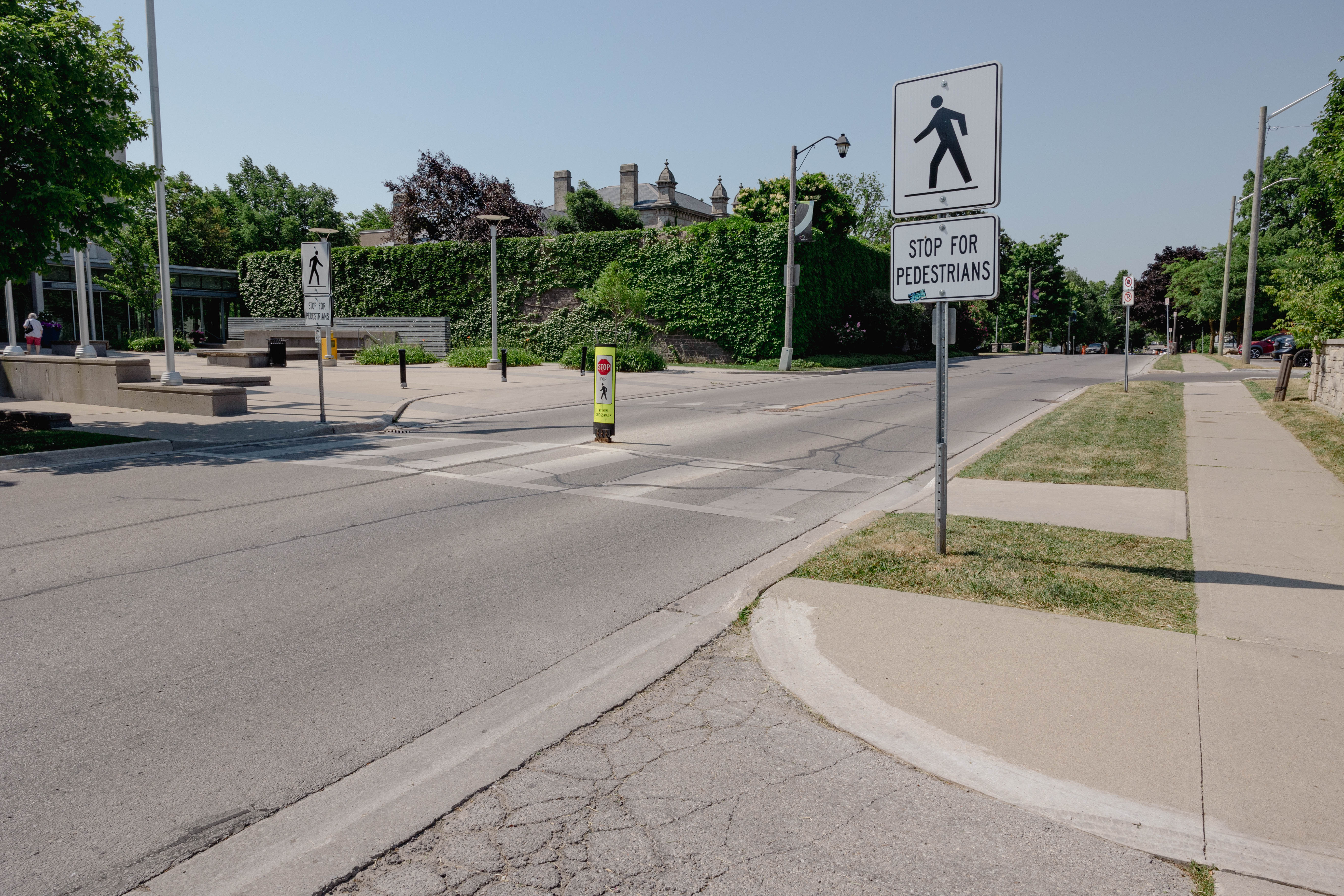 A crosswalk with signs