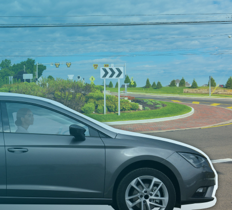 A car driving through a roundabout