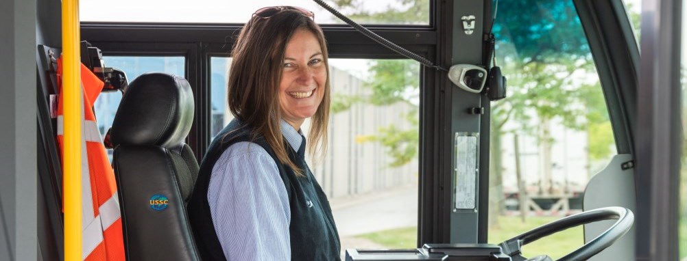 Bus driver smiling