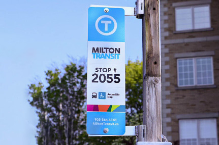 A bus sign showcasing accessible transit