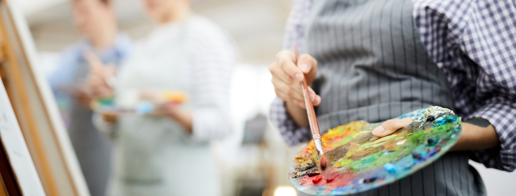 A group of people painting