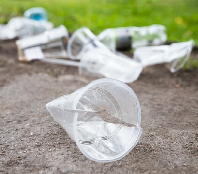 Plastic cups and other litter on the ground