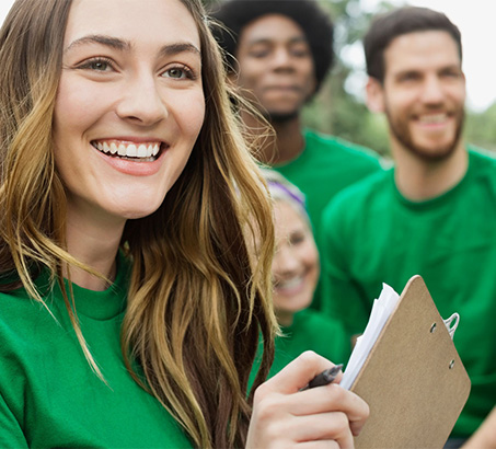 A group of volunteers smiling