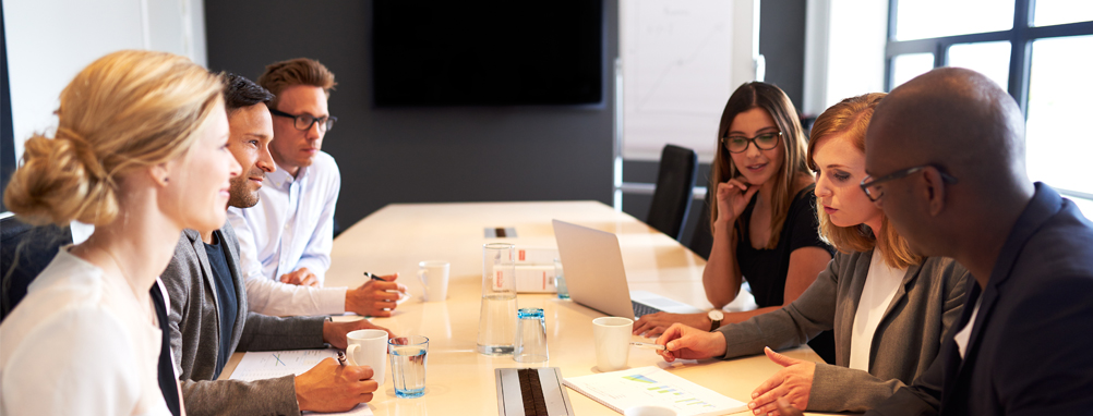 group of people in a meeting room